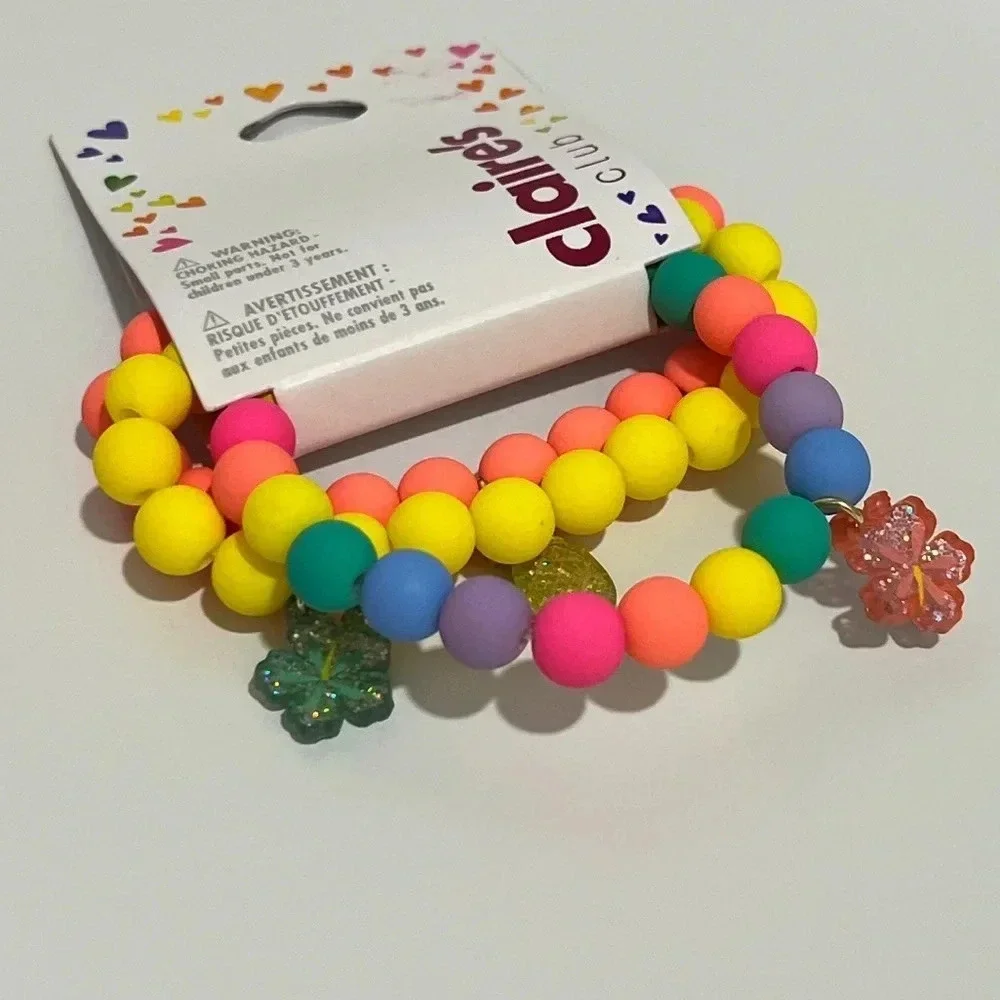Claire’s bundle with backpack, 3 bracelets, 6 hair clips, pen and earrings